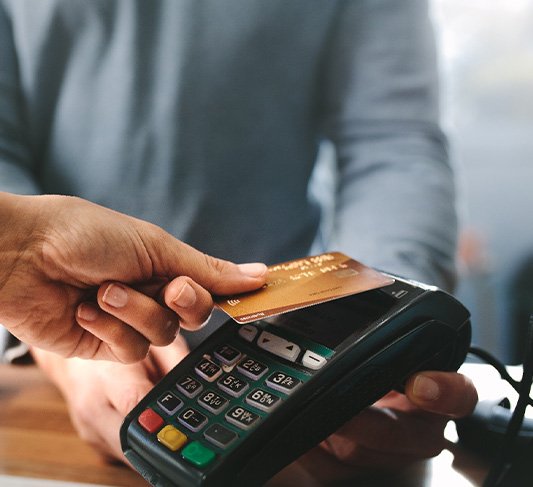 Female dental patient after receiving dental implants in North Raleigh, NC